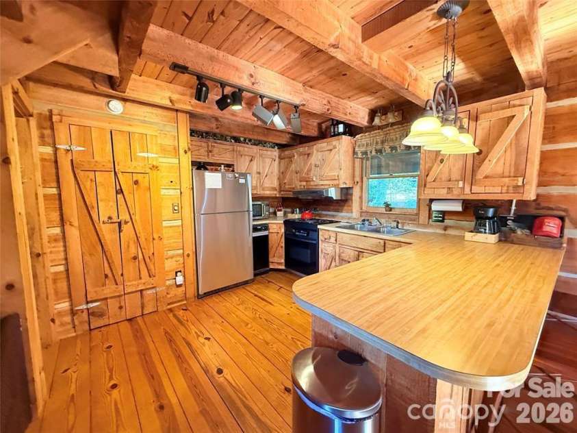 452 Wilderness Drive, Marion, NC 28752.  MLS# CAR4401461, YatesRealty ID 35714. 