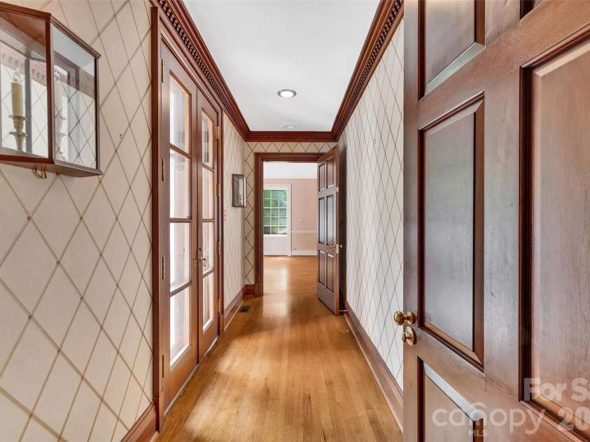 333 Chestnut Street, Troy, NC 27371.  MLS# CAR4397678, YatesRealty ID 35719. Hallway from study to primary bedroom