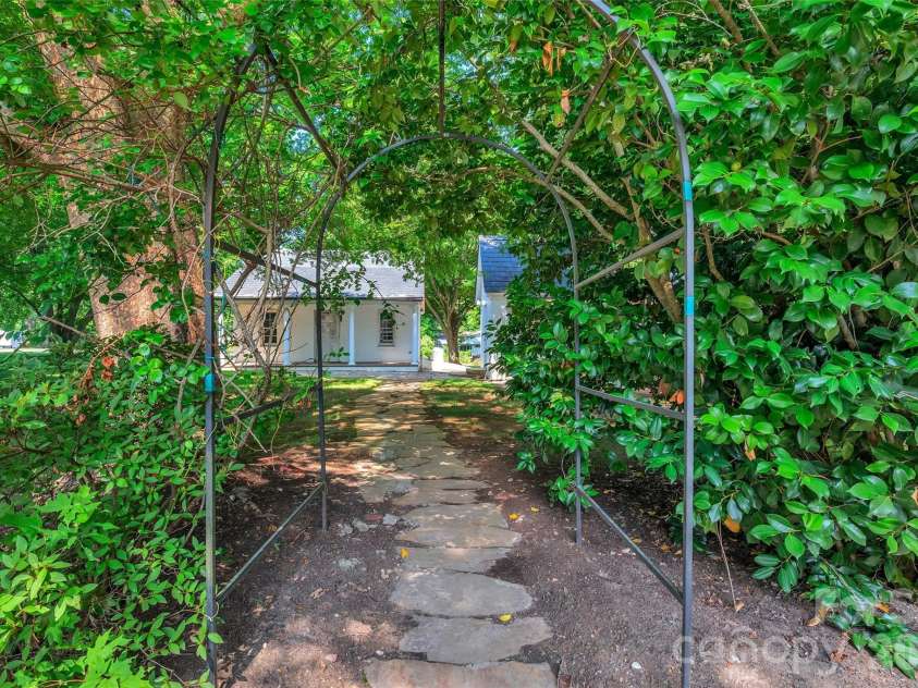 333 Chestnut Street, Troy, NC 27371.  MLS# CAR4397678, YatesRealty ID 35719. Pass thru to smokehouse & workshop