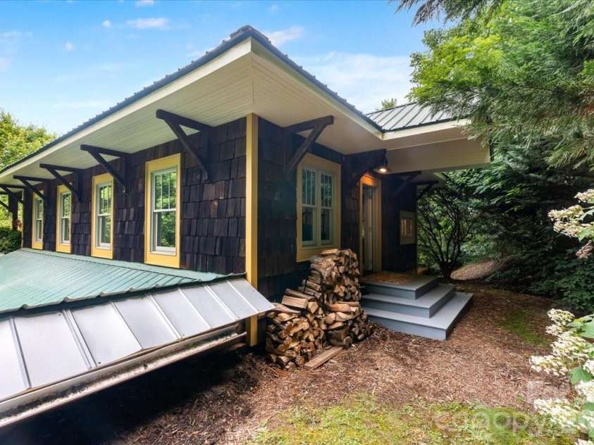 128 Barnet Mountain Drive, Marshall, NC 28753.  MLS# CAR4390222, YatesRealty ID 35721. Porch off the primary bedroom