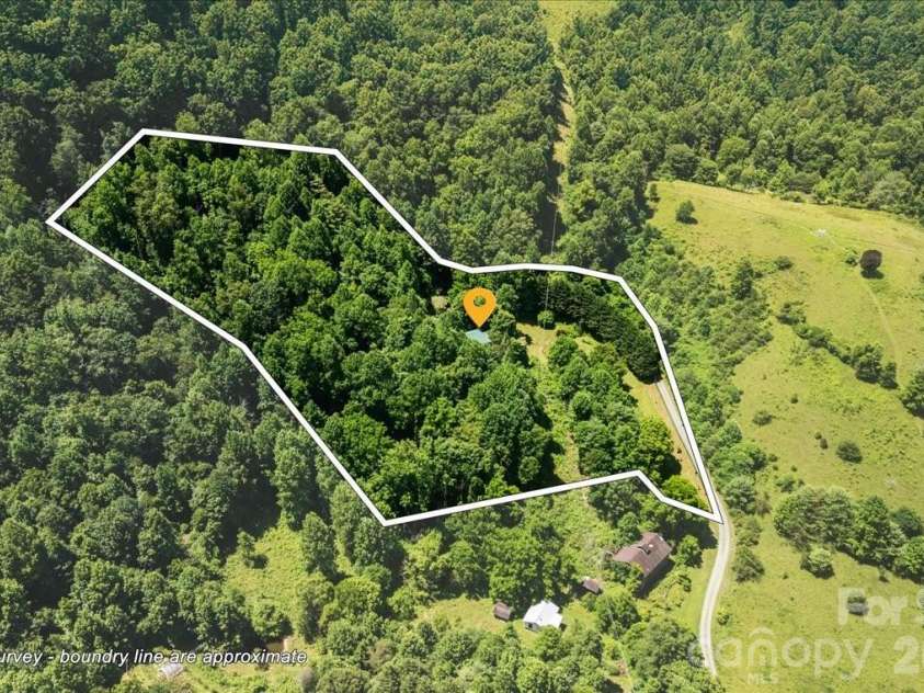 128 Barnet Mountain Drive, Marshall, NC 28753.  MLS# CAR4390222, YatesRealty ID 35721. Property approximate boundary lines.