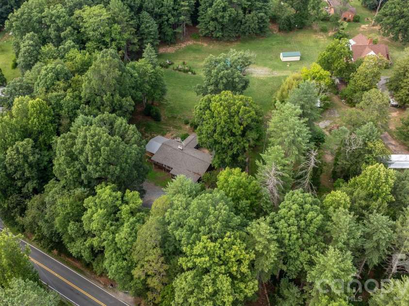 3466 Dry Ponds Road, Granite Falls, NC 28630.  MLS# CAR4393948, YatesRealty ID 35722. 0.72 acres surrounded by mature trees