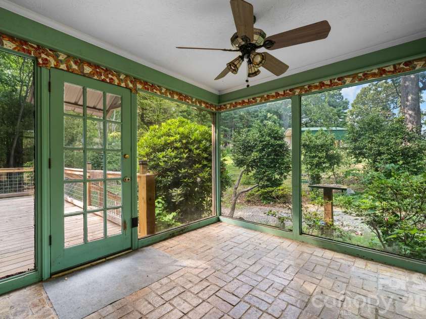 3466 Dry Ponds Road, Granite Falls, NC 28630.  MLS# CAR4393948, YatesRealty ID 35722. Sunroom with brick flooring