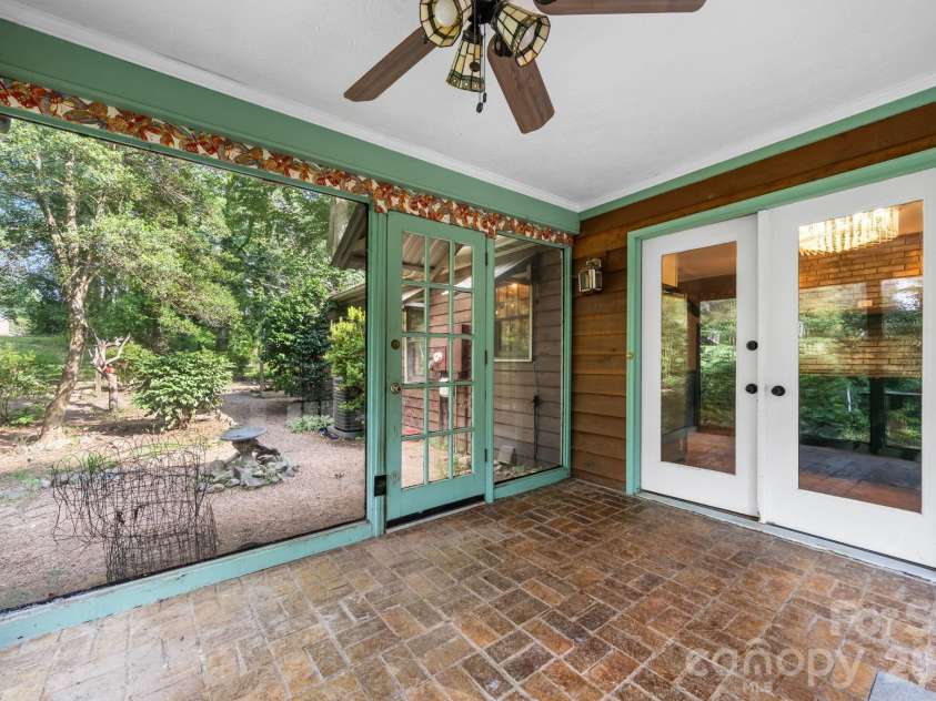 3466 Dry Ponds Road, Granite Falls, NC 28630.  MLS# CAR4393948, YatesRealty ID 35722. Sunroom with brick flooring
