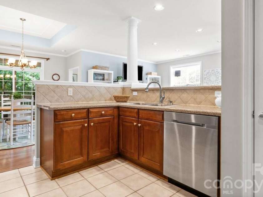 9069 Rosalyn Glen Road, Cornelius, NC 28031.  MLS# CAR4395009, YatesRealty ID 35726. Breakfast Bar Area in front of Sink