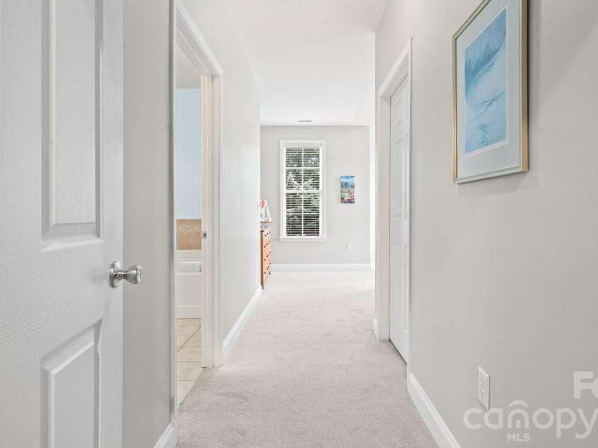 9069 Rosalyn Glen Road, Cornelius, NC 28031.  MLS# CAR4395009, YatesRealty ID 35726. Entry Way to Primary Bedroom