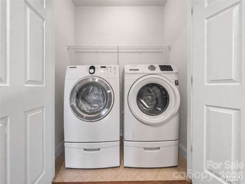 9069 Rosalyn Glen Road, Cornelius, NC 28031.  MLS# CAR4395009, YatesRealty ID 35726. Laundry Closet in Hall