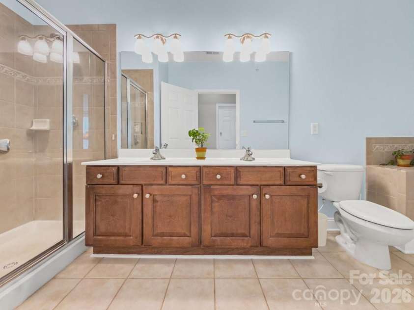 9069 Rosalyn Glen Road, Cornelius, NC 28031.  MLS# CAR4395009, YatesRealty ID 35726. Primary Bath w Shower & Garden Tub