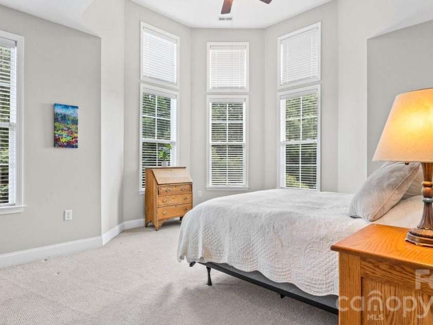 9069 Rosalyn Glen Road, Cornelius, NC 28031.  MLS# CAR4395009, YatesRealty ID 35726. Primary Bedroom