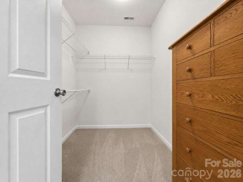 9069 Rosalyn Glen Road, Cornelius, NC 28031.  MLS# CAR4395009, YatesRealty ID 35726. Primary Walk-IN Closet