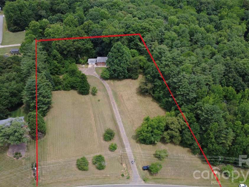 155 Duck Creek Road, Troutman, NC 28166.  MLS# CAR4399881, YatesRealty ID 35728. All brick home with 5.88 useable acres!