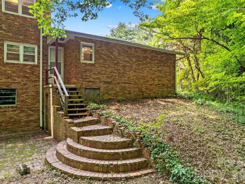 155 Duck Creek Road, Troutman, NC 28166.  MLS# CAR4399881, YatesRealty ID 35728. Private back yard & entertaining area!