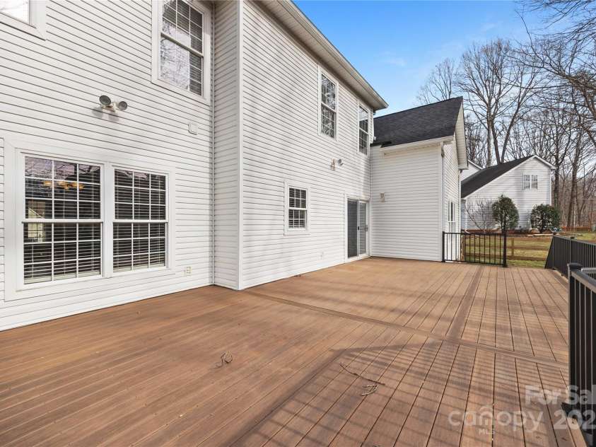 112 Fransher Lane, Mooresville, NC 28117.  MLS# CAR4331248, YatesRealty ID 3573. Beautiful backyard deck