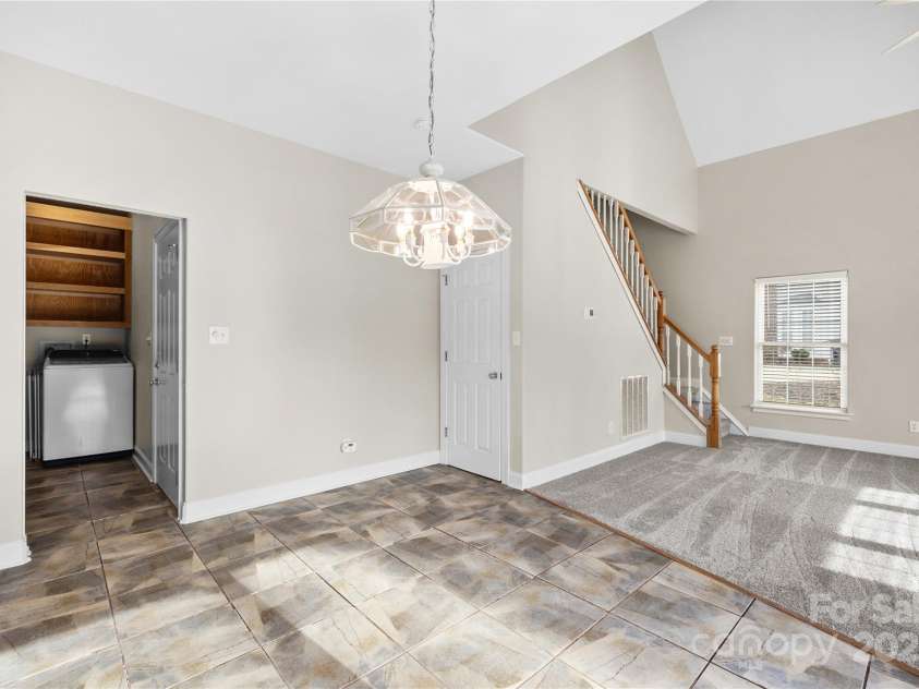 112 Fransher Lane, Mooresville, NC 28117.  MLS# CAR4331248, YatesRealty ID 3573. Breakfast area opens to the 2 story great room.