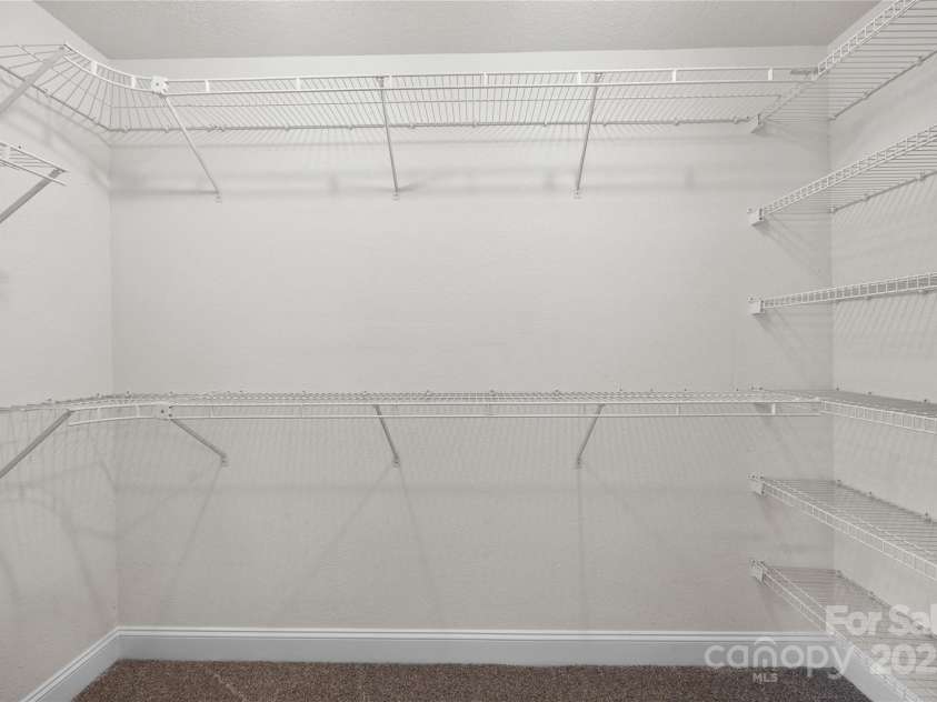 112 Fransher Lane, Mooresville, NC 28117.  MLS# CAR4331248, YatesRealty ID 3573. One of two primary bedroom walk-in closets