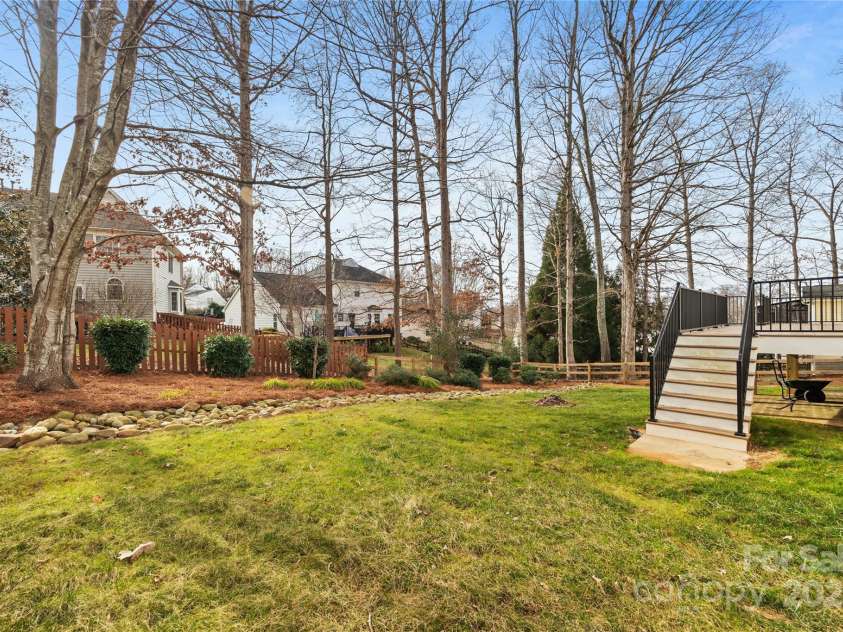 112 Fransher Lane, Mooresville, NC 28117.  MLS# CAR4331248, YatesRealty ID 3573. Professionally landscaped backyard