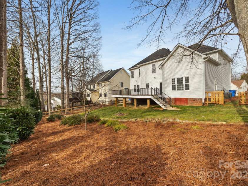 112 Fransher Lane, Mooresville, NC 28117.  MLS# CAR4331248, YatesRealty ID 3573. Professionally landscaped backyard that is fully fenced.
