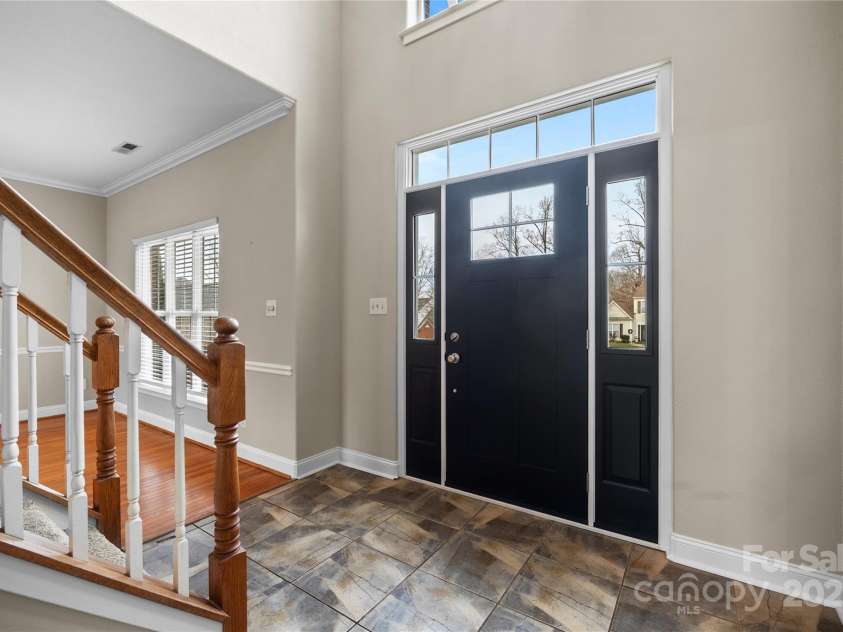 112 Fransher Lane, Mooresville, NC 28117.  MLS# CAR4331248, YatesRealty ID 3573. Stepping in the front door you are greeted by a beautiful 2 story foyer.