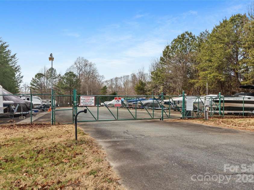 112 Fransher Lane, Mooresville, NC 28117.  MLS# CAR4331248, YatesRealty ID 3573. Winslow Bay community boat/RV storage