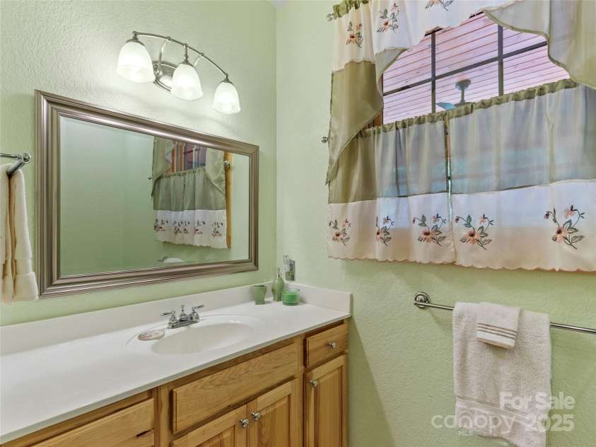 263 Wolf Mountain Road, Green Mountain, NC 28740.  MLS# CAR4148202, YatesRealty ID 3574. Bathroom