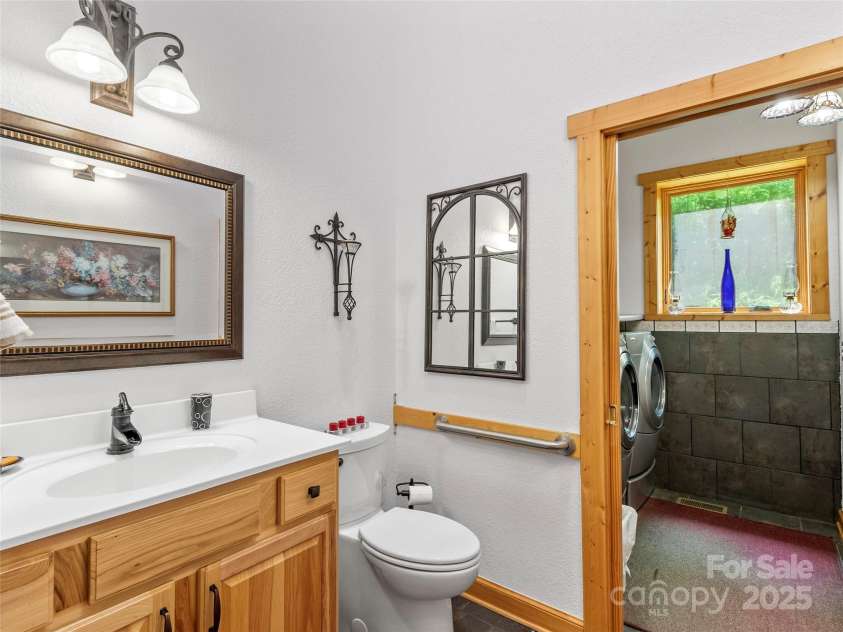 263 Wolf Mountain Road, Green Mountain, NC 28740.  MLS# CAR4148202, YatesRealty ID 3574. Half bathroom