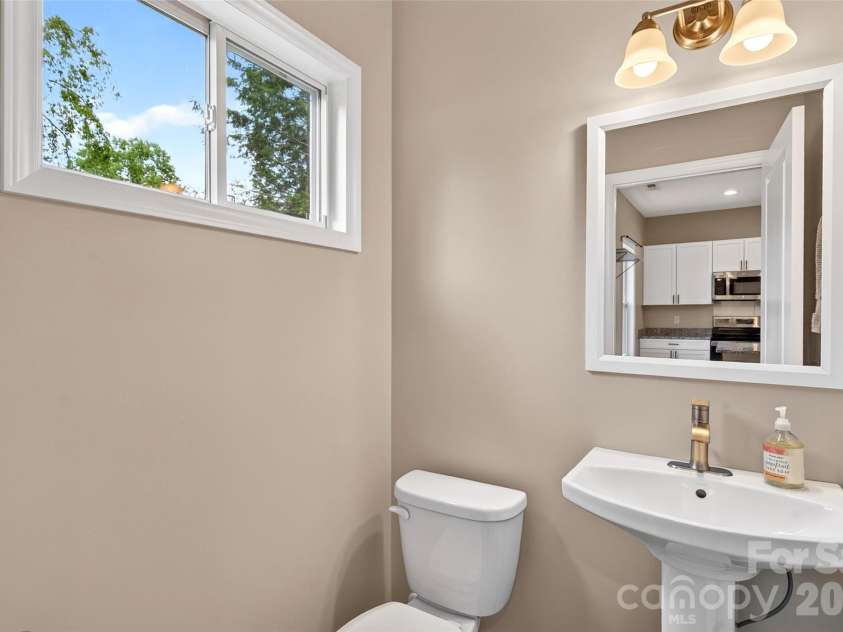 88 Walker Street, Black Mountain, NC 28711.  MLS# CAR4393259, YatesRealty ID 35747. Downstairs 1/2 Bath