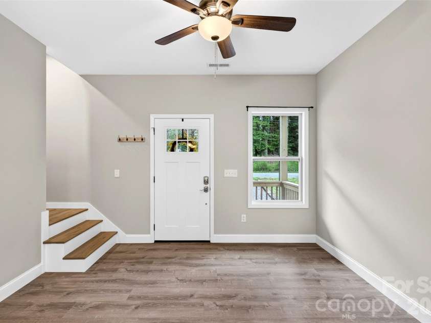 88 Walker Street, Black Mountain, NC 28711.  MLS# CAR4393259, YatesRealty ID 35747. Front Door/ Living Room