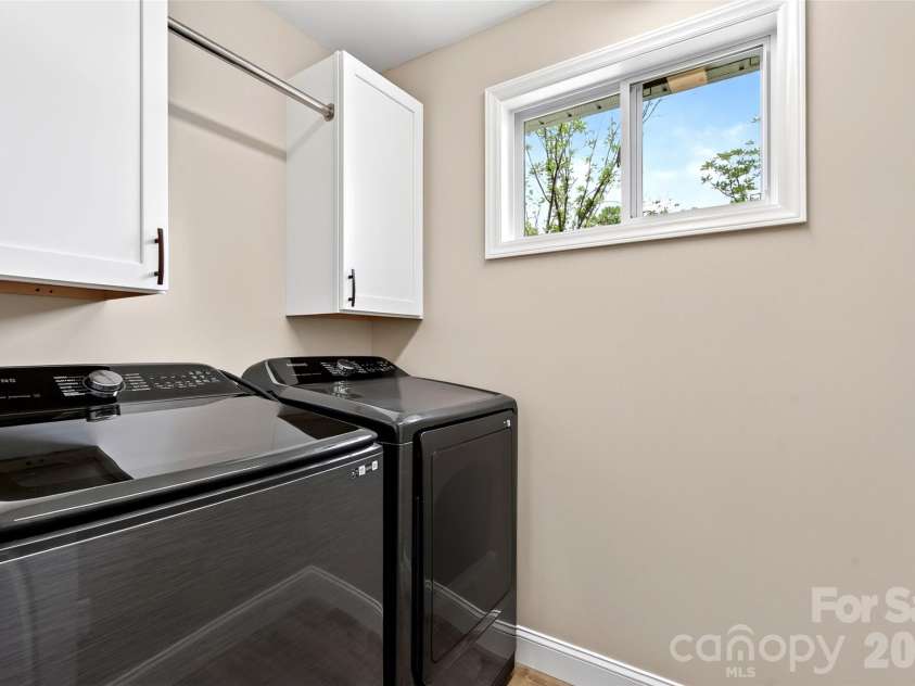 88 Walker Street, Black Mountain, NC 28711.  MLS# CAR4393259, YatesRealty ID 35747. Laundry Room on second level