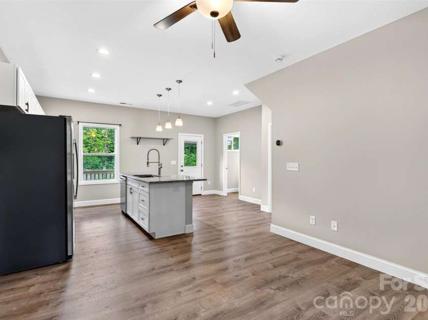 88 Walker Street, Black Mountain, NC 28711.  MLS# CAR4393259, YatesRealty ID 35747. Living Room looking into Kitchen