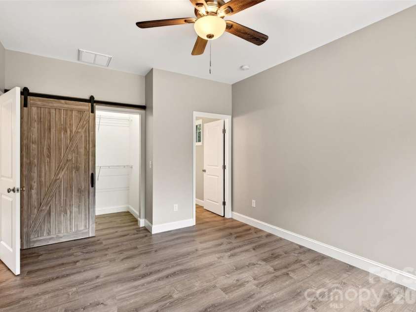 88 Walker Street, Black Mountain, NC 28711.  MLS# CAR4393259, YatesRealty ID 35747. Primary on Main Level Barn Door into Closet