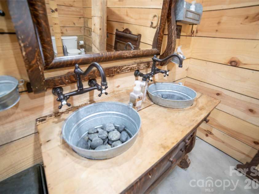 4885 Grandin Road, Lenoir, NC 28645.  MLS# CAR4346888, YatesRealty ID 35749. Barn restrooms