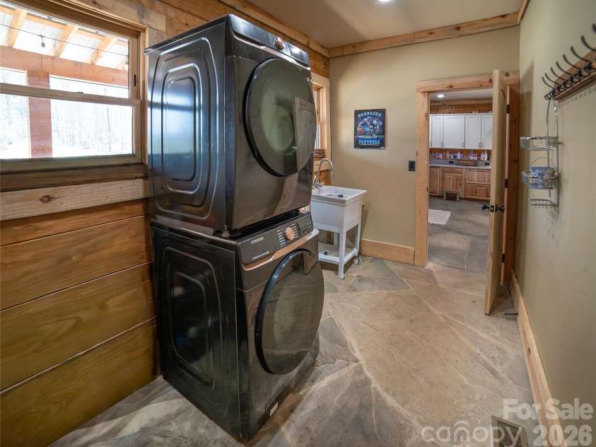 4885 Grandin Road, Lenoir, NC 28645.  MLS# CAR4346888, YatesRealty ID 35749. Laundry room on main with separate doors to main hallway and kitchen