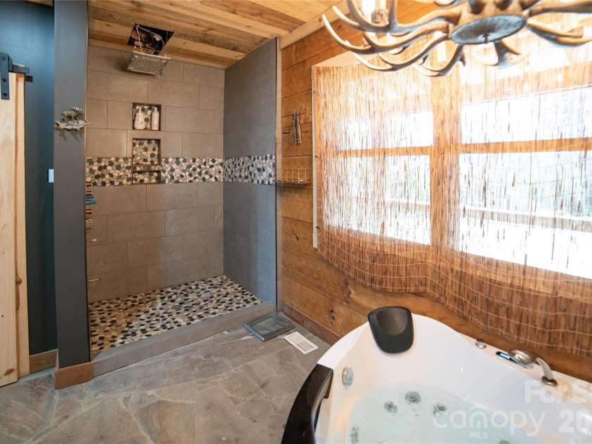 4885 Grandin Road, Lenoir, NC 28645.  MLS# CAR4346888, YatesRealty ID 35749. Primary ensuite rainfall shower