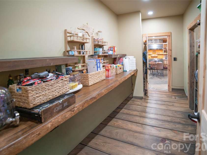 4885 Grandin Road, Lenoir, NC 28645.  MLS# CAR4346888, YatesRealty ID 35749. Walk through pantry with additional walk-in pantry storage