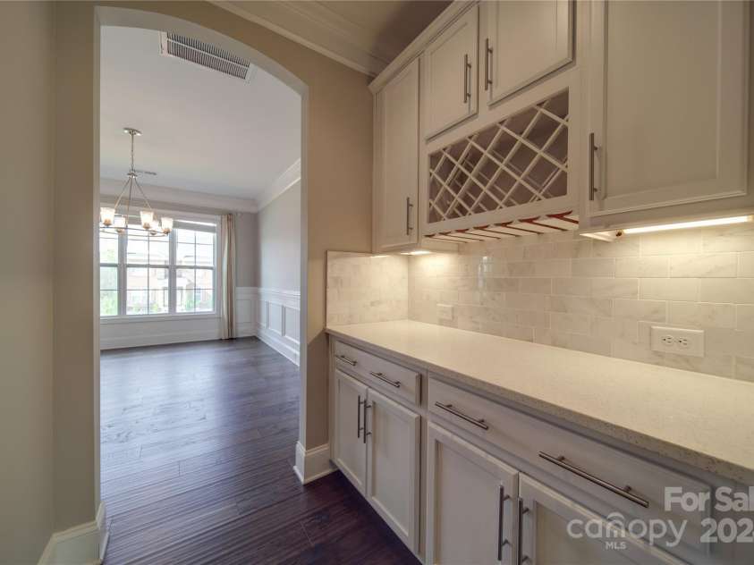 10881 Greenvale Drive, Harrisburg, NC 28075.  MLS# CAR4196765, YatesRealty ID 3575. Butlers Pantry