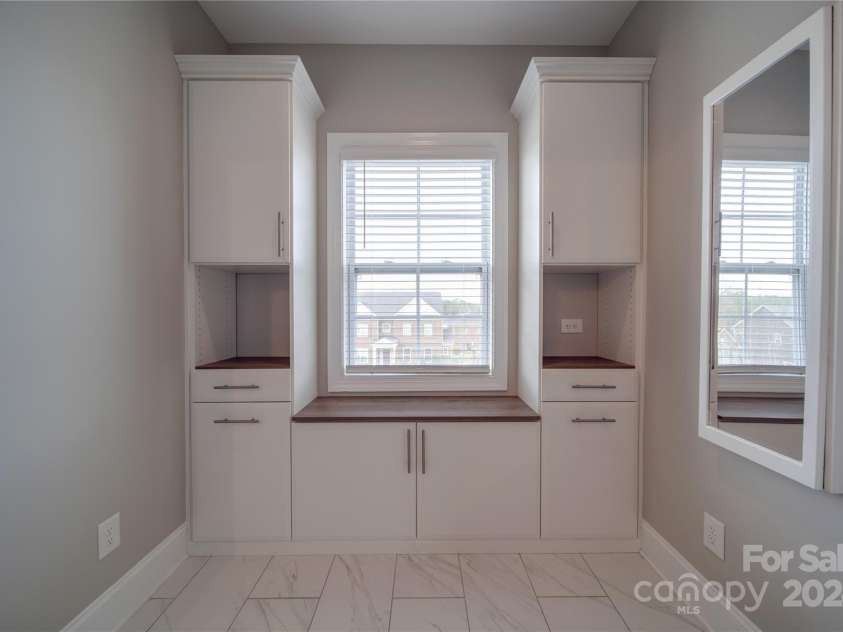 10881 Greenvale Drive, Harrisburg, NC 28075.  MLS# CAR4196765, YatesRealty ID 3575. Coffee Bar in Primary Bathroom