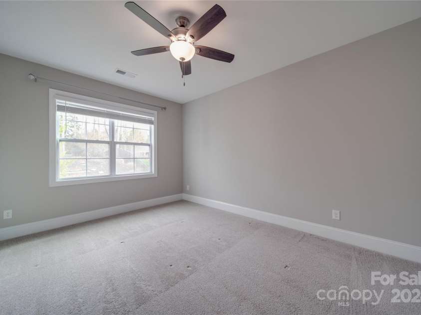 10881 Greenvale Drive, Harrisburg, NC 28075.  MLS# CAR4196765, YatesRealty ID 3575. Downstairs Guest Bedroom