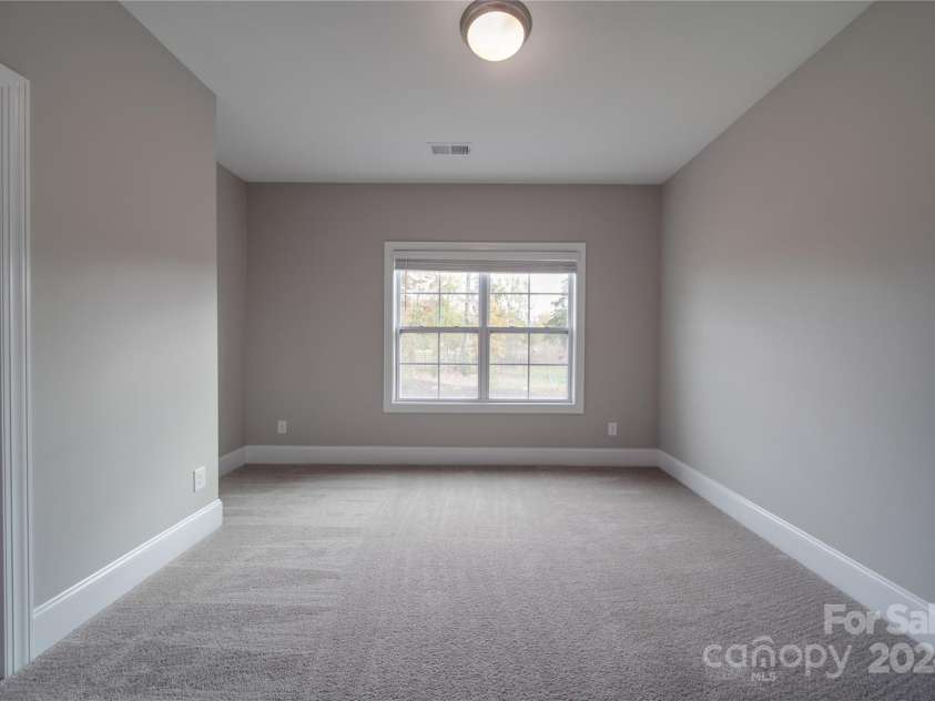 10881 Greenvale Drive, Harrisburg, NC 28075.  MLS# CAR4196765, YatesRealty ID 3575. Sitting Area in Primary Bedroom