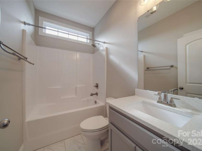 10881 Greenvale Drive, Harrisburg, NC 28075.  MLS# CAR4196765, YatesRealty ID 3575. Upstairs Full Bathroom 1