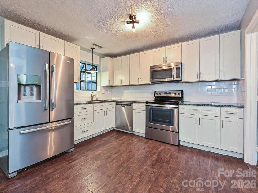 9111 Sharonbrook Drive, Charlotte, NC 28210.  MLS# CAR4401019, YatesRealty ID 35752. 