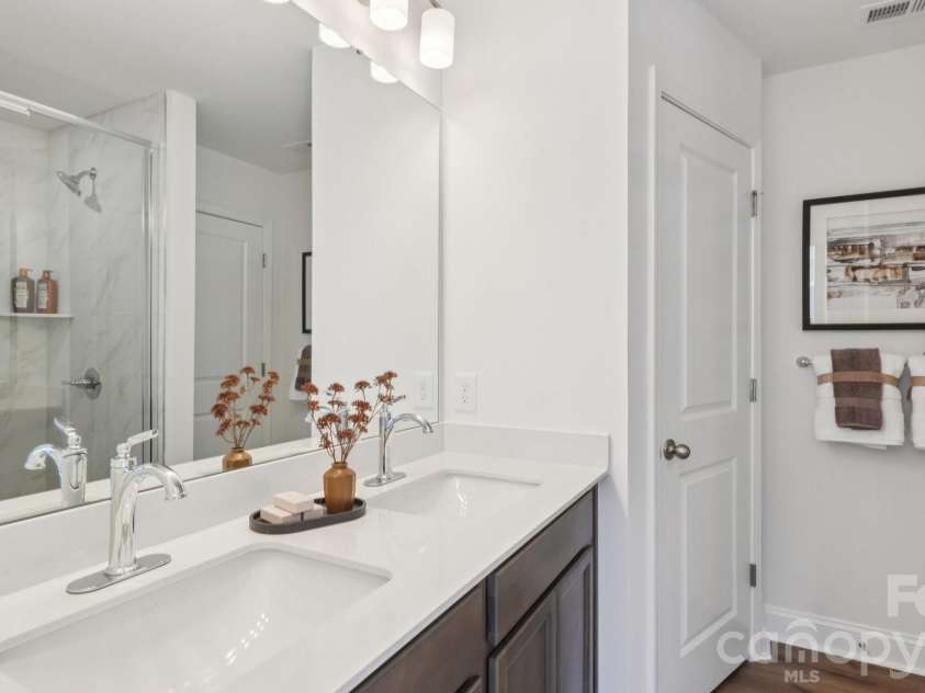 2213 Gladwyne Place, Charlotte, NC 28269.  MLS# CAR4402182, YatesRealty ID 35763. Representative Photo From Model - Primary Bathroom