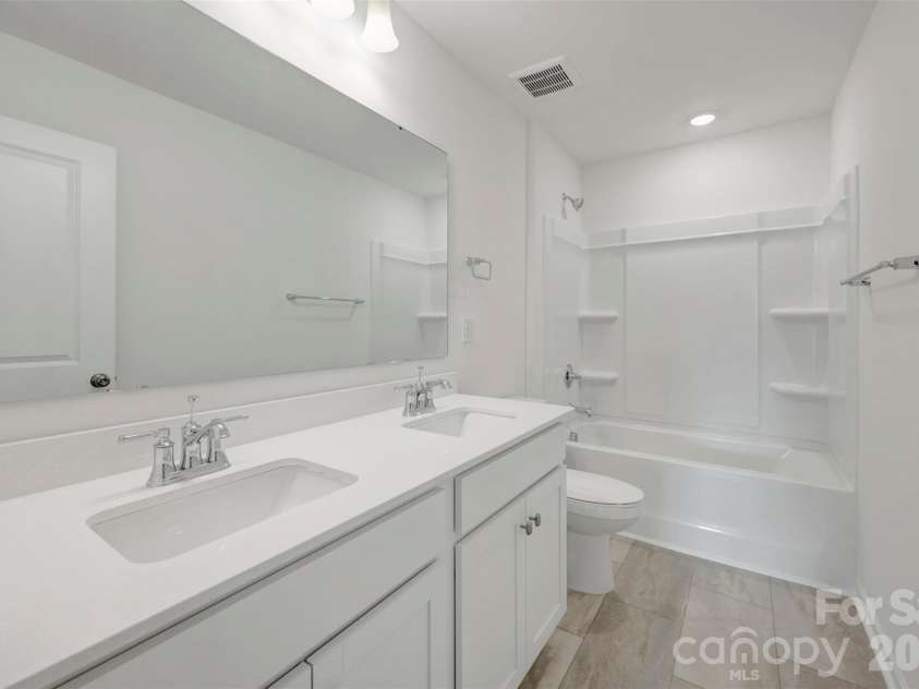 512 Willoughby Park Drive, Monroe, NC 28112.  MLS# CAR4401345, YatesRealty ID 35767. Secondary bathroom