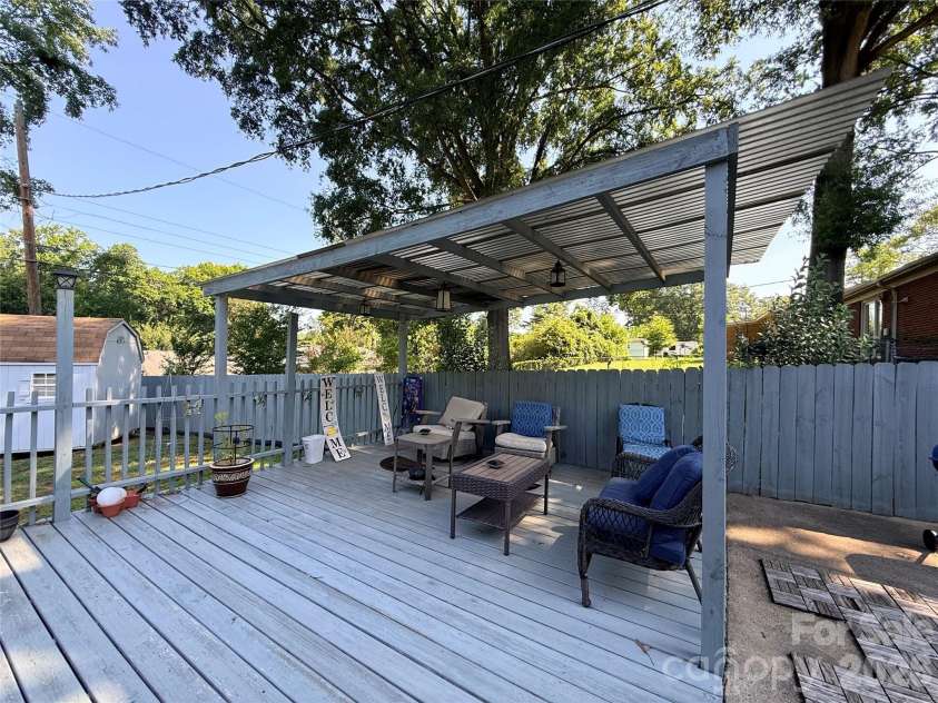 3626 Seaman Drive, Charlotte, NC 28217.  MLS# CAR4402104, YatesRealty ID 35780. Covered pergola area