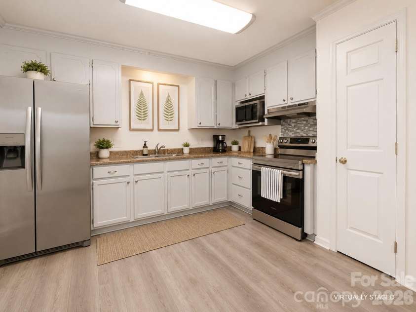 3626 Seaman Drive, Charlotte, NC 28217.  MLS# CAR4402104, YatesRealty ID 35780. Virtually Staged Kitchen
