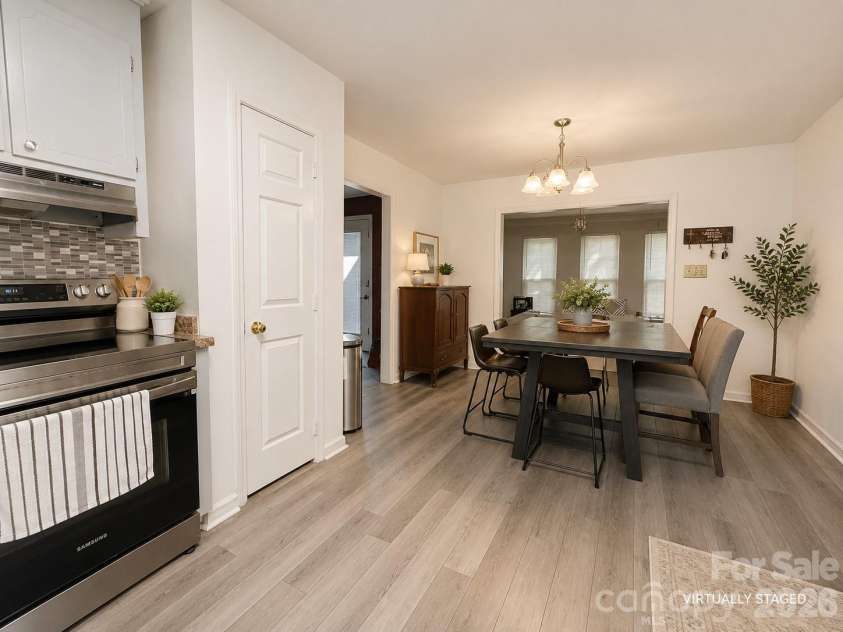 3626 Seaman Drive, Charlotte, NC 28217.  MLS# CAR4402104, YatesRealty ID 35780. Virtually staged Kitchen and dining area