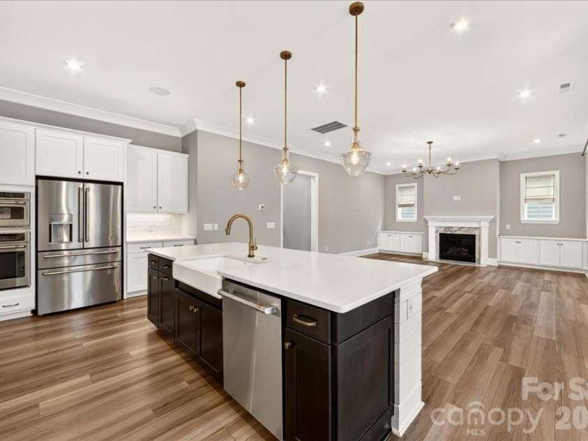 222 Lanyard Lane, Belmont, NC 28012.  MLS# CAR4400918, YatesRealty ID 35784. Kitchen with Cafe Appliances, Pull out drawers in soft close cabinets