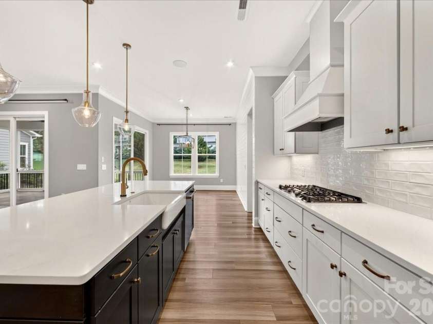 222 Lanyard Lane, Belmont, NC 28012.  MLS# CAR4400918, YatesRealty ID 35784. Kitchen with Cafe Appliances, Pull out drawers in soft close cabinets