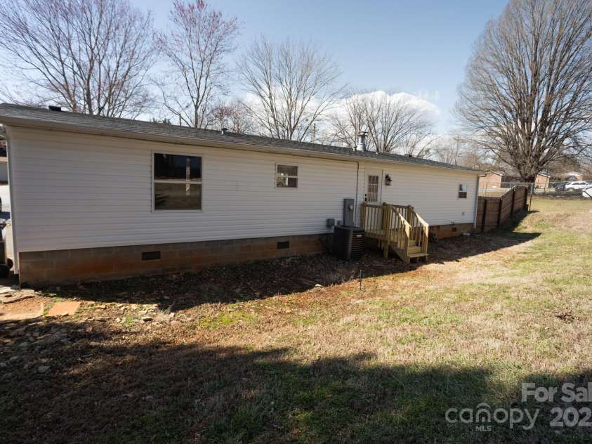 111 Hollar Street, Morganton, NC 28655.  MLS# CAR4232117, YatesRealty ID 3579. View of the rear of the home from the backyard
