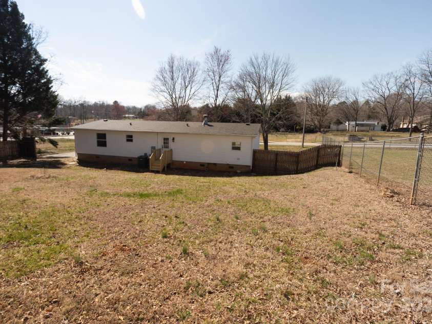 111 Hollar Street, Morganton, NC 28655.  MLS# CAR4232117, YatesRealty ID 3579. View of the rear of the home from the backyard