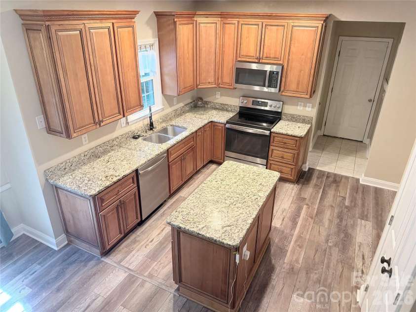 7605 Keating Drive, Oak Ridge, NC 27310.  MLS# CAR4402309, YatesRealty ID 35792. 